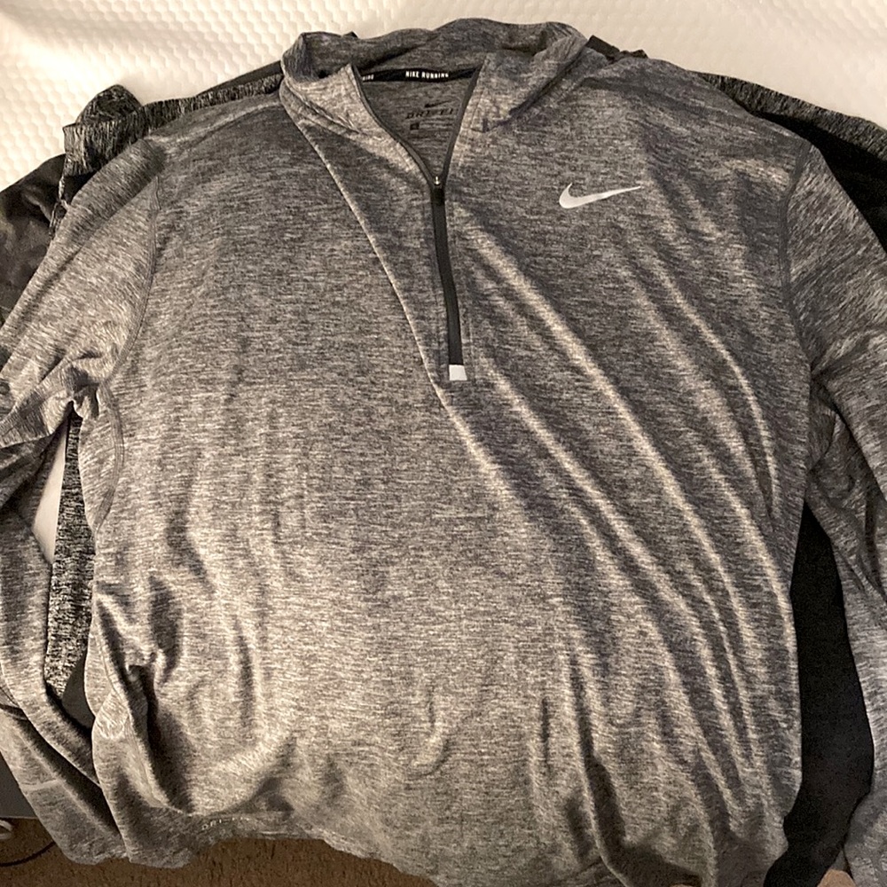 Long sleeve Nike Dr-Fit running shirt with reflective features.